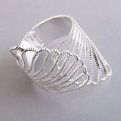 Guess Filigree Silver-Tone Claw Cuff Bracelet